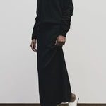 Black cashmere blend knit midi skirt by Mijeong Park