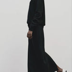 Black cashmere blend knit midi skirt by Mijeong Park