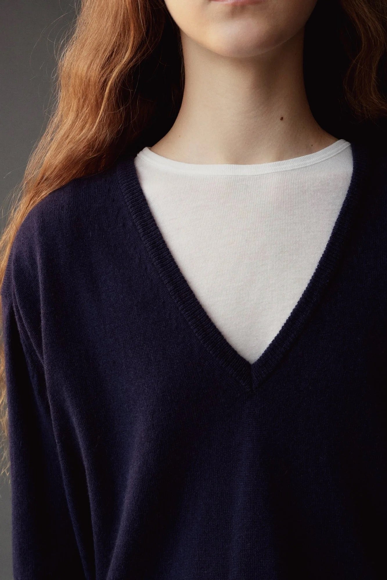 Mijeong Park Cashmere Blend V-Neck Knit Navy close-up showing deep V-neck and fine knit texture