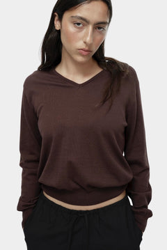 Close-up of brown cotton blend v neck knit top by Mijeong Park showing lightweight knit texture