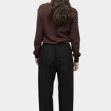 Back view of cotton blend v neck knit top in brown by Mijeong Park with relaxed fit and rib hem
