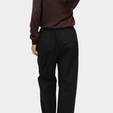 Mijeong Park black cotton drawstring pants back view wide leg relaxed silhouette womens designer trousers patch pocket detail