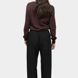 Mijeong Park black cotton drawstring pants back view relaxed wide leg elastic waist womens minimalist designer trousers patch pocket