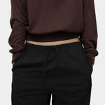 Mijeong Park cotton drawstring pants black relaxed wide leg trousers elastic waist minimalist womens designer pants detail