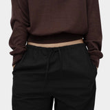 Mijeong Park cotton drawstring pants black relaxed wide leg trousers elastic waist minimalist womens designer pants detail