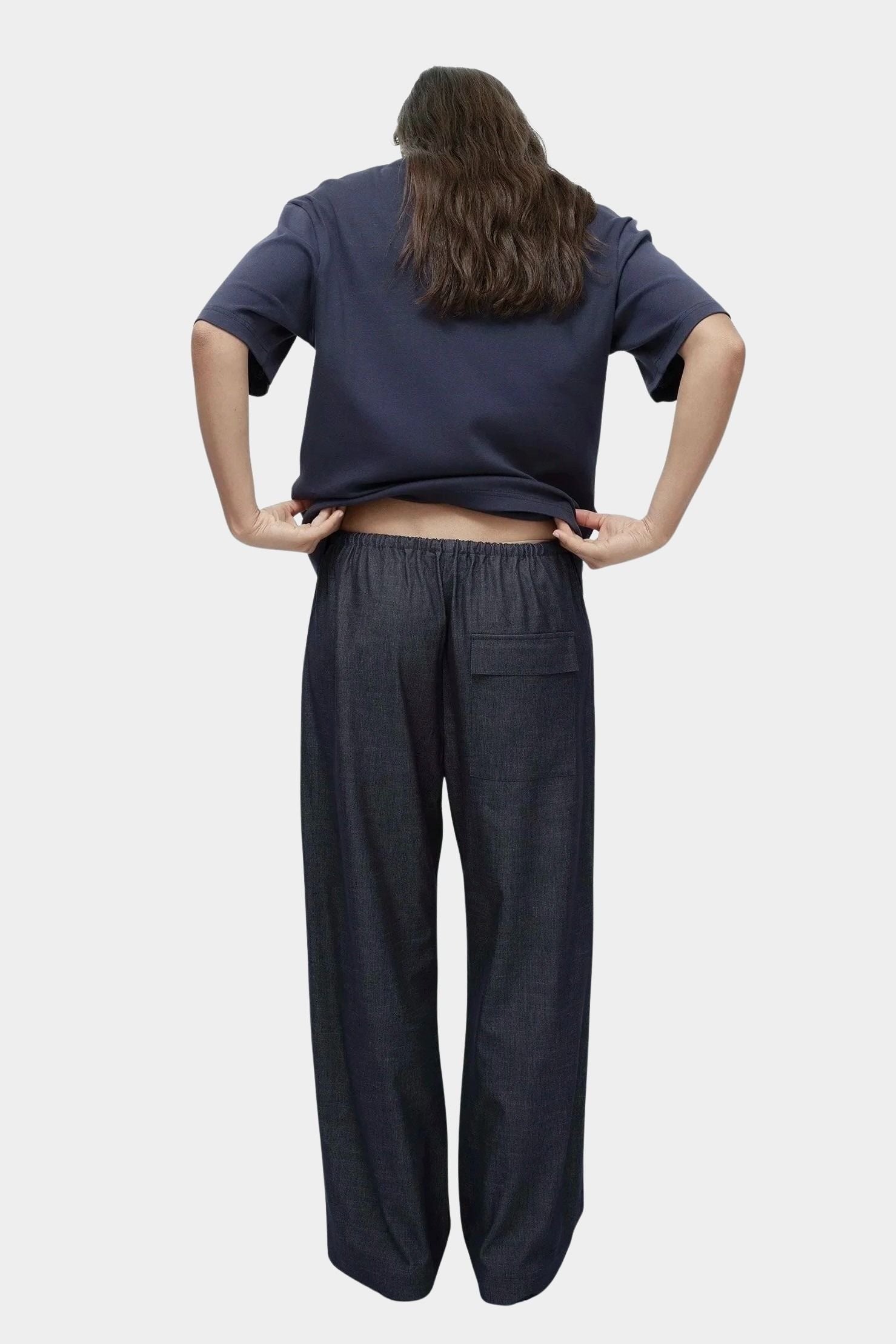 Mijeong Park denim drawstring pants back view relaxed wide leg elastic waist minimalist womens designer trousers