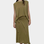 Full outfit green drape back knit top by Mijeong Park styled with matching wrap knit skirt