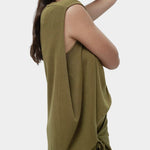Side profile green drape back knit top by Mijeong Park with fluid sleeveless silhouette and back drape