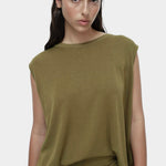 Front portrait green drape back knit top by Mijeong Park with relaxed sleeveless knit silhouette