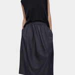 Front view navy drape back knit top by Mijeong Park with relaxed sleeveless silhouette
