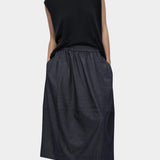 Front view navy drape back knit top by Mijeong Park with relaxed sleeveless silhouette
