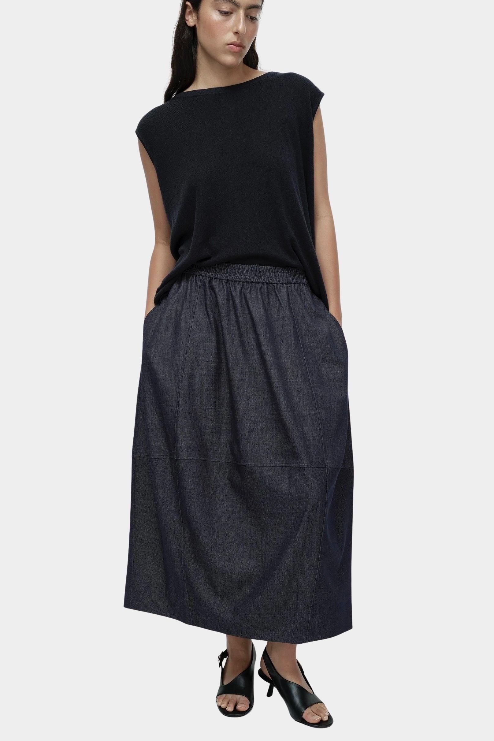 Front view navy drape back knit top by Mijeong Park with relaxed sleeveless silhouette
