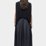 Back view navy drape back knit top by Mijeong Park with relaxed sleeveless silhouette