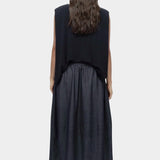 Back view navy drape back knit top by Mijeong Park with relaxed sleeveless silhouette