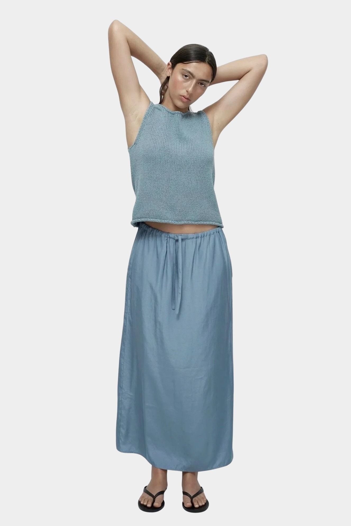 Mijeong Park blue drawstring midi skirt lightweight satin elastic waist relaxed straight fit full length front view
