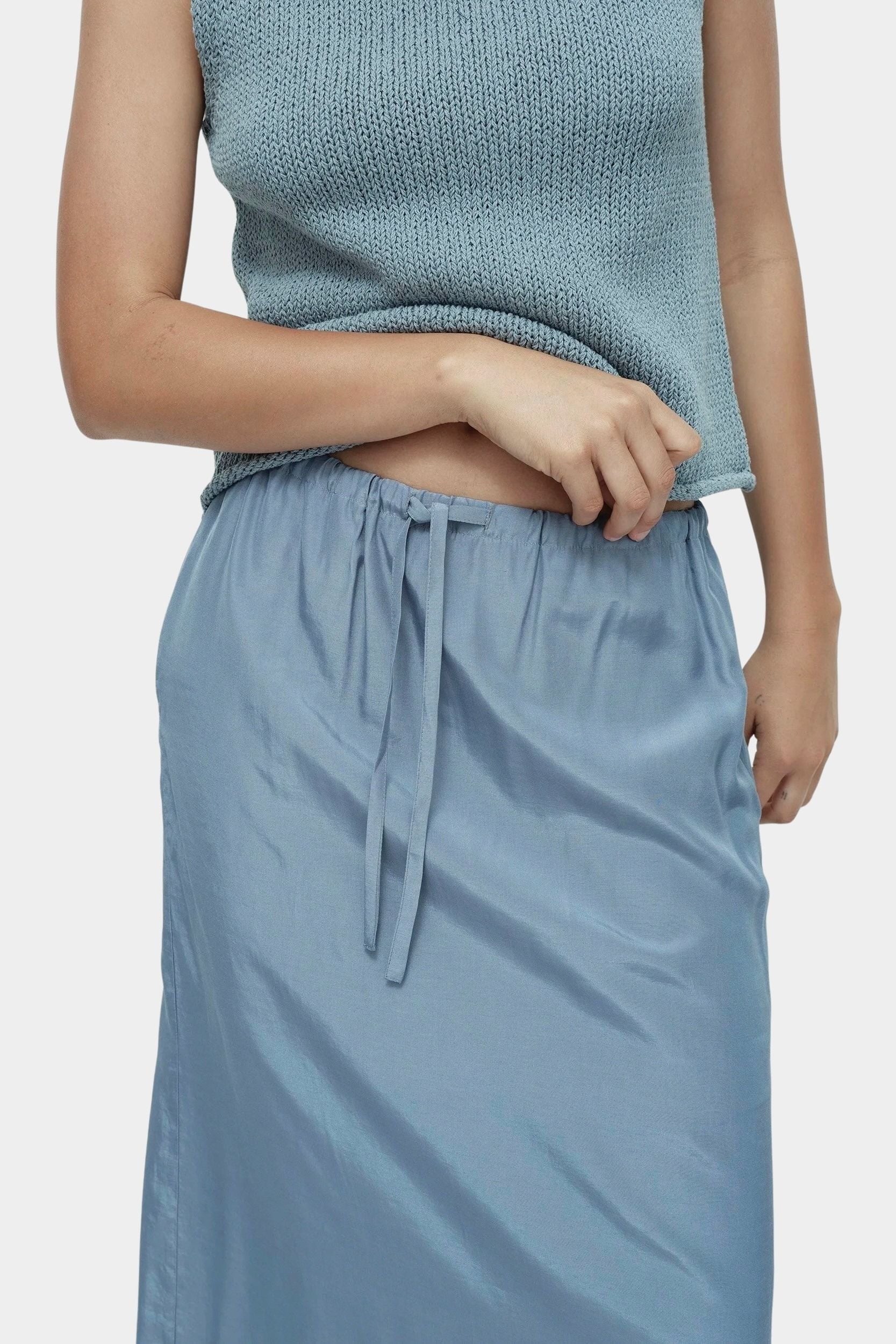 Mijeong Park blue drawstring midi skirt close-up elastic waistband drawstring lightweight satin fabric
