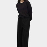 Mijeong Park black linen blend cropped pants wide leg cropped trousers styled with sheer knit top womens designer outfit