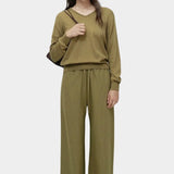 Mijeong Park green linen blend cropped pants full length front view wide leg elastic waist minimalist womens designer trousers
