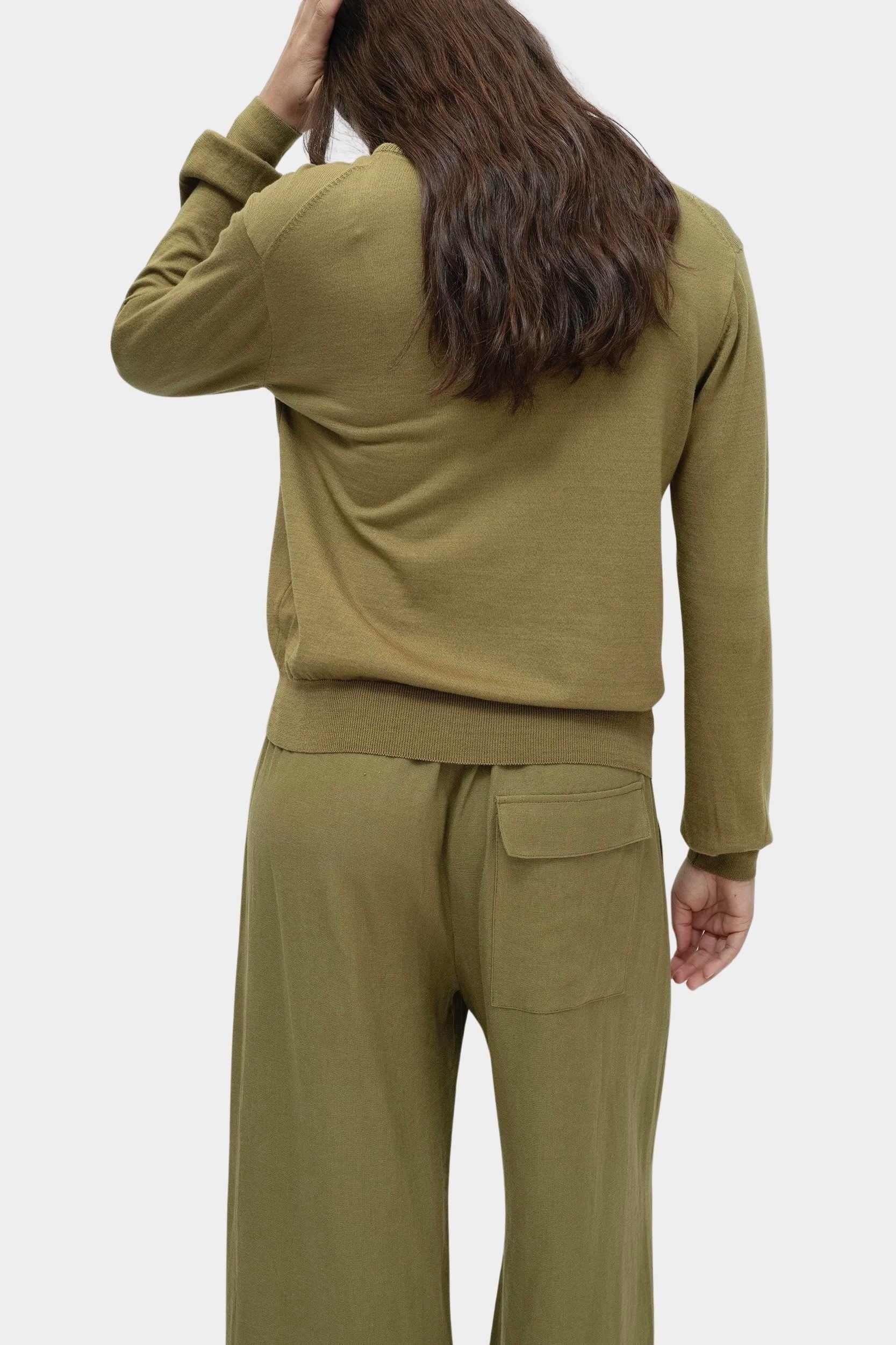 Mijeong Park green linen blend cropped pants back view wide leg cropped silhouette womens minimalist designer trousers