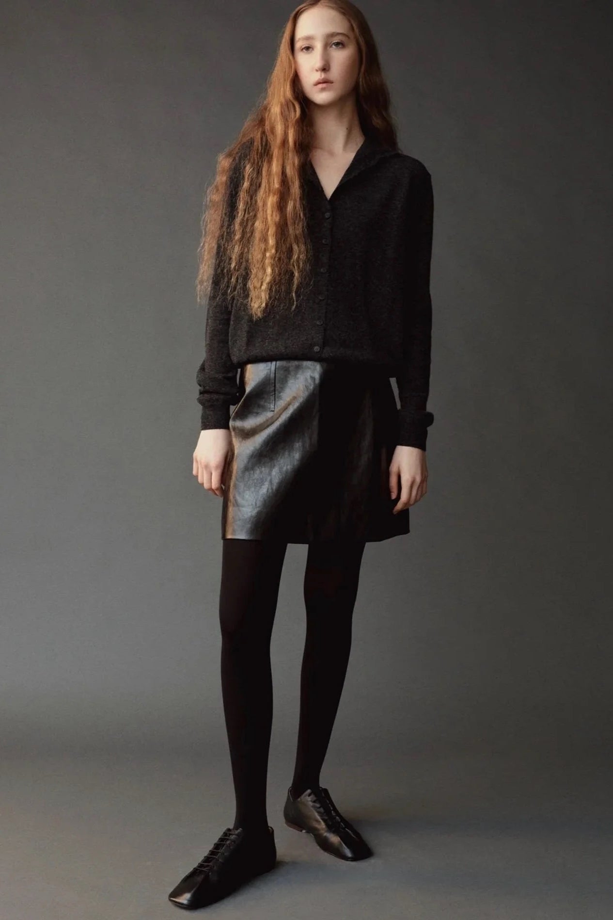 Mijeong Park Mock Neck Cardigan Charcoal full front view showing relaxed fit and button closure