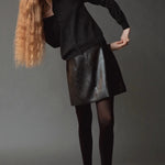 Mijeong Park Mock Neck Cardigan Charcoal styled with black leather skirt at YUCCA Denver