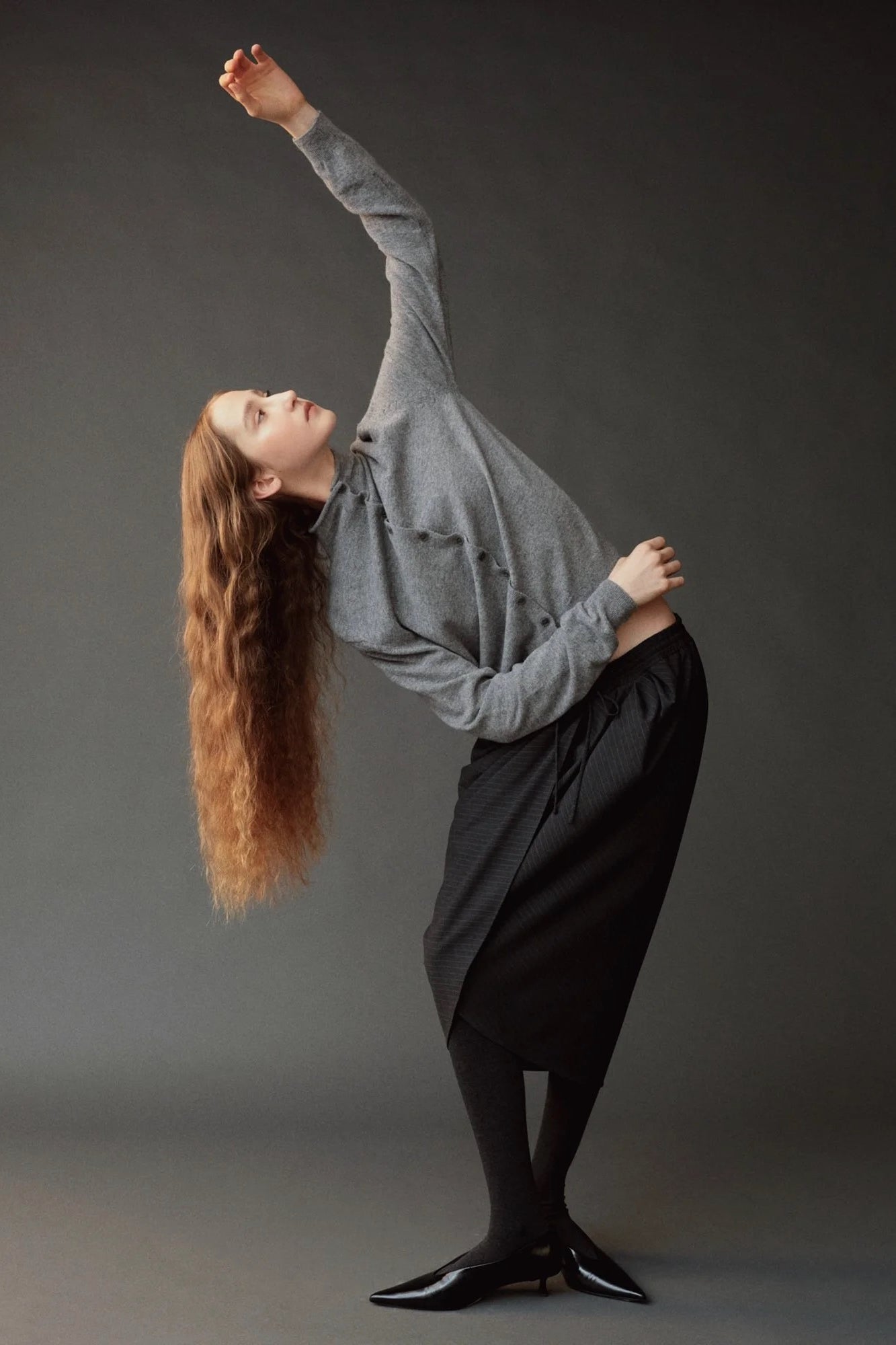Mijeong Park Mock Neck Cardigan Gray styled side view showing relaxed fit and long sleeves