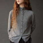 Mijeong Park Mock Neck Cardigan Gray front detail showing button front and softly rolled mock neck