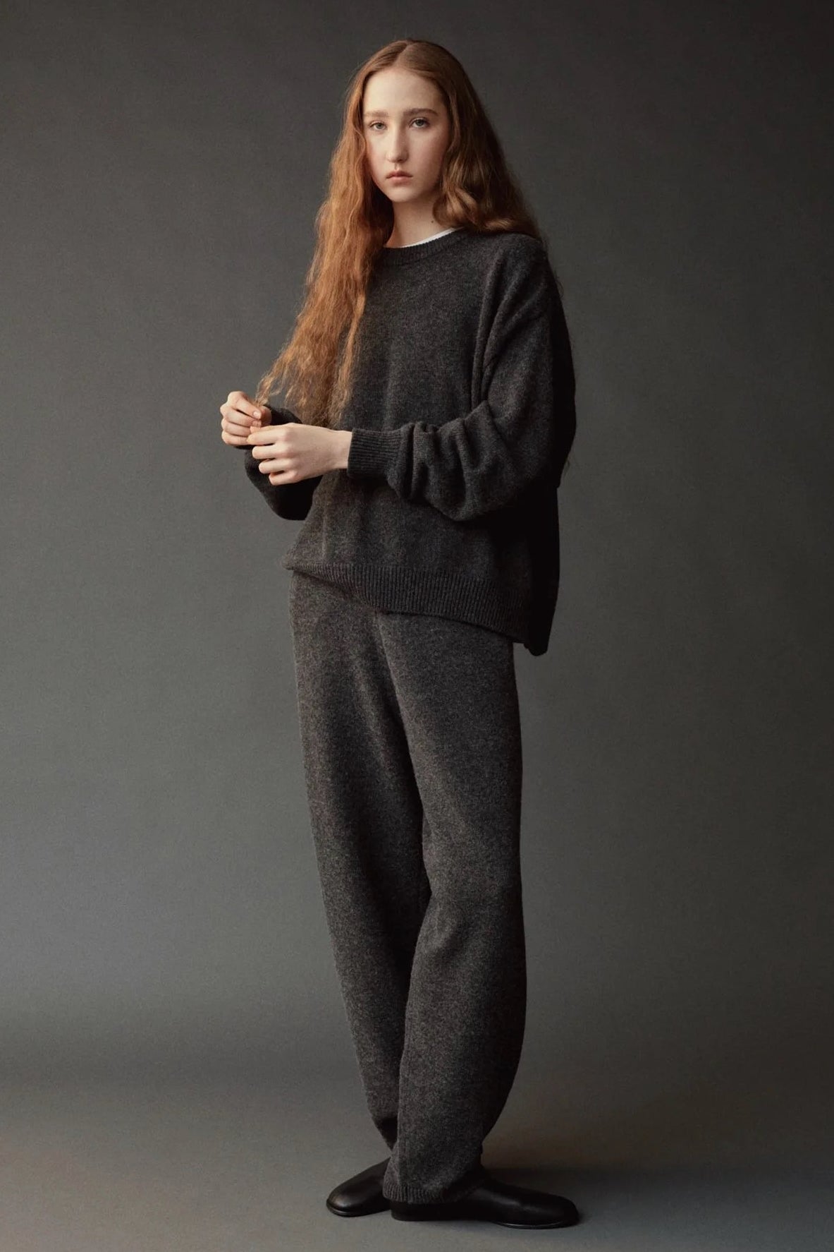 Mijeong Park Oversized Crewneck Sweater Charcoal styled with matching wide leg knit pants