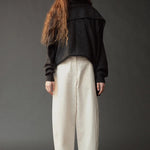 Mijeong Park Oversized Crewneck Sweater Charcoal layered with matching knit shawl and white pants