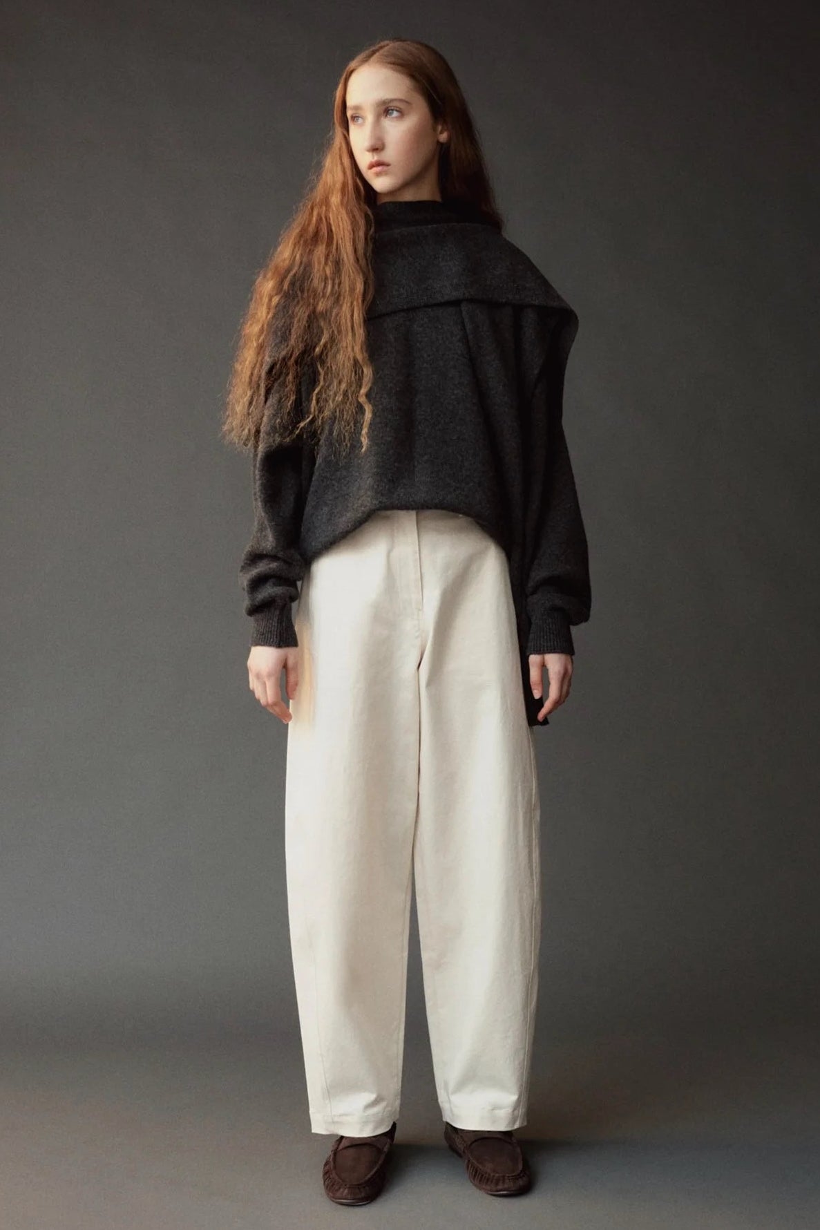Mijeong Park Oversized Crewneck Sweater Charcoal layered with matching knit shawl and white pants