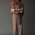 Mijeong Park Oversized Crewneck Sweater Dark Beige layered with matching knit pieces and wide leg pants