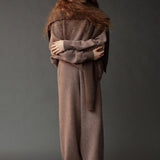 Mijeong Park Oversized Crewneck Sweater Dark Beige layered with matching knit pieces and wide leg pants