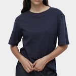 Mijeong Park navy oversized cotton t-shirt relaxed crewneck tee front view styled with dark denim trousers