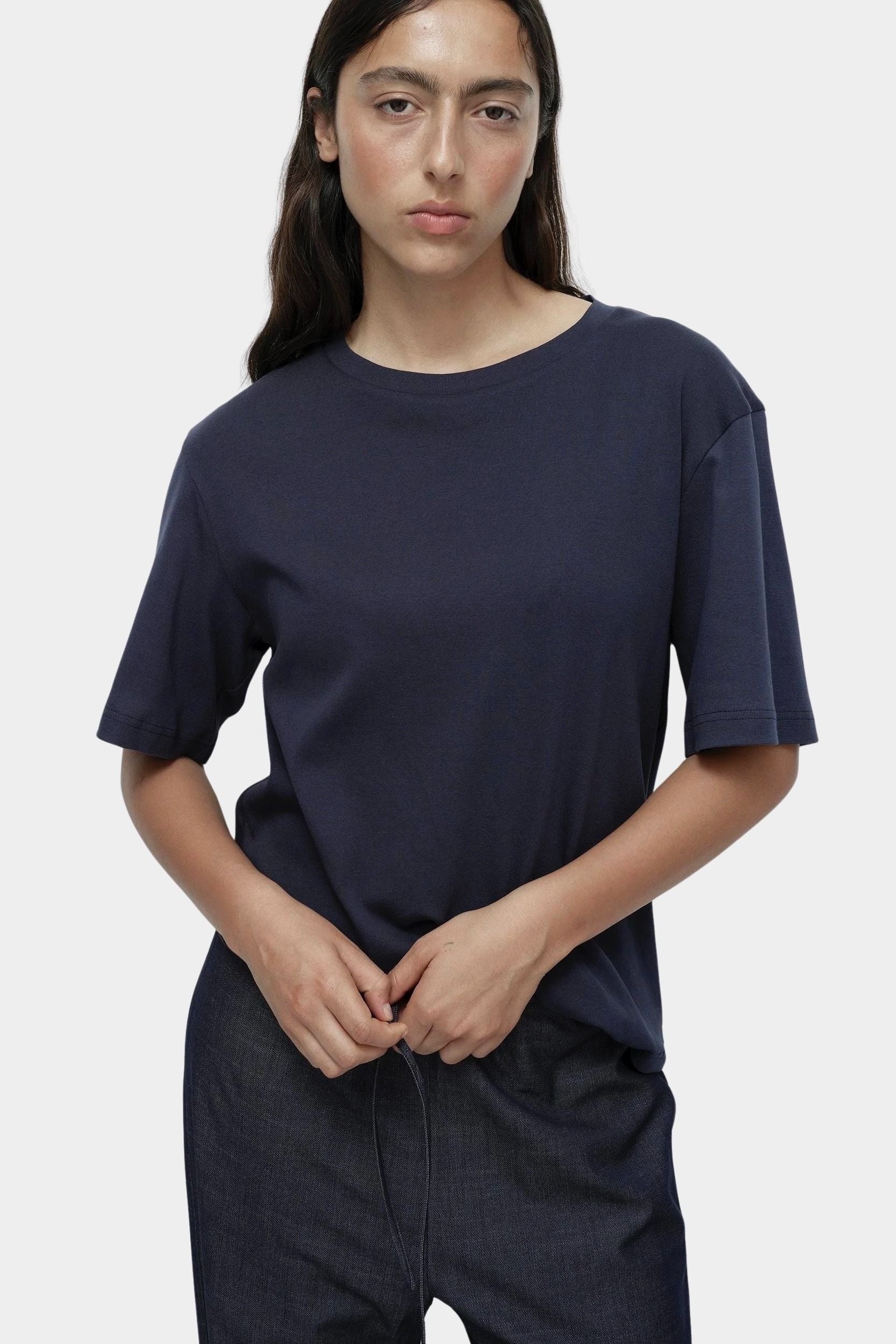 Mijeong Park navy oversized cotton t-shirt relaxed crewneck tee front view styled with dark denim trousers