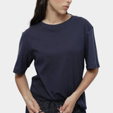 Mijeong Park navy oversized cotton t-shirt relaxed crewneck tee styled with dark denim drawstring trousers