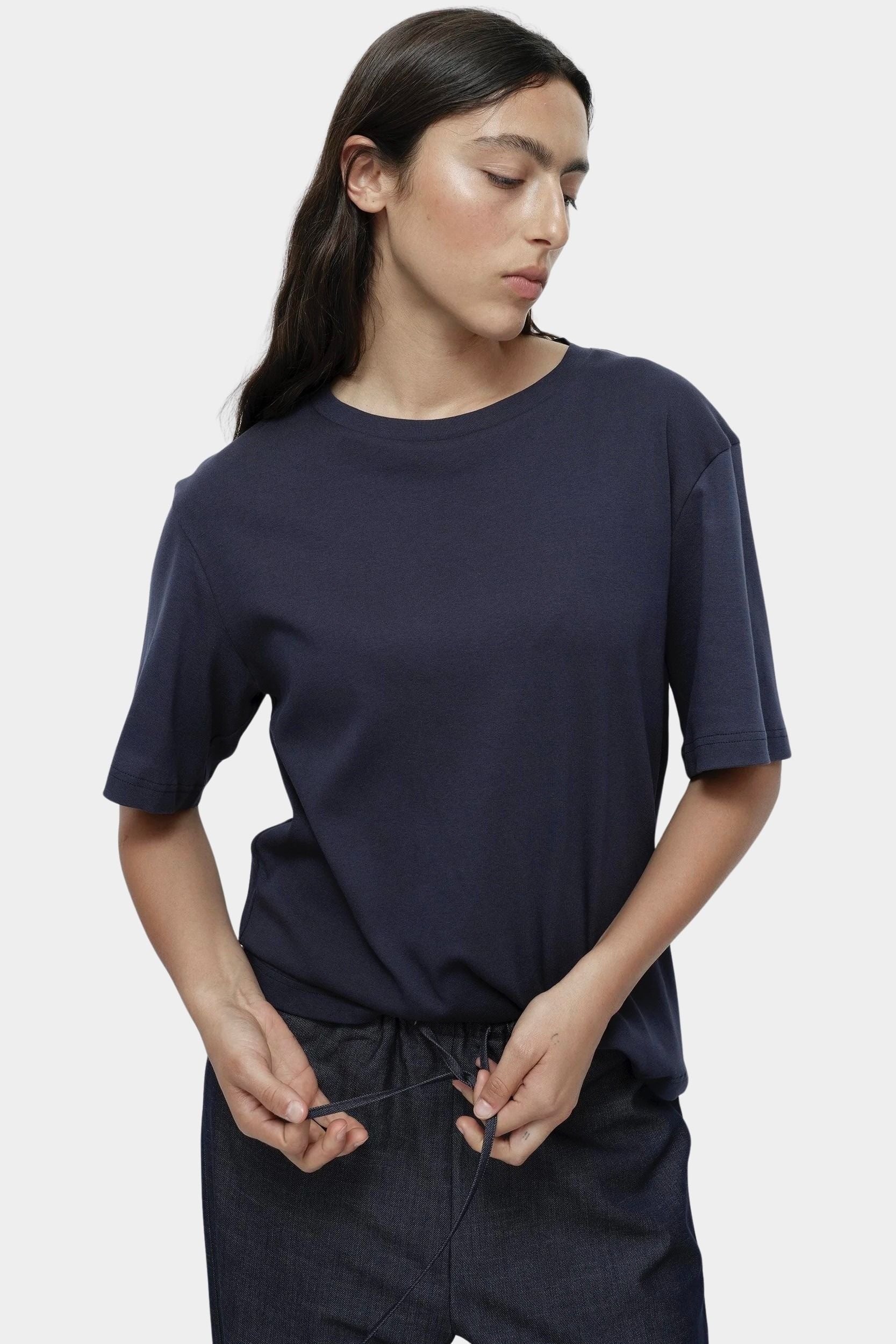 Mijeong Park navy oversized cotton t-shirt relaxed crewneck tee styled with dark denim drawstring trousers