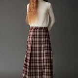 Front view of the Mijeong Park Plaid Midi Skirt showing its full A line silhouette