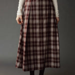 Close front view of the Mijeong Park Plaid Midi Skirt showing the waistband and pleat detailing