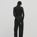 Black slim fit Tencel cotton roll neck top by Mijeong Park