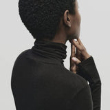 Black slim fit Tencel cotton roll neck top by Mijeong Park