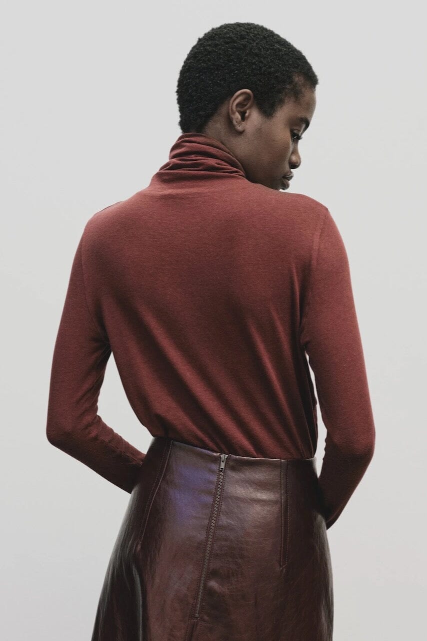 Burgundy slim fit roll neck jersey top in stretch Tencel cotton by Mijeong Park