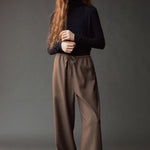 Front view of the dark navy roll neck jersey top at SHOP YUCCA in Denver.