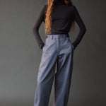 Front view of the graphite roll neck jersey top with a slim fit and long sleeves.