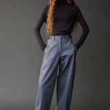 Front view of the graphite roll neck jersey top with a slim fit and long sleeves.