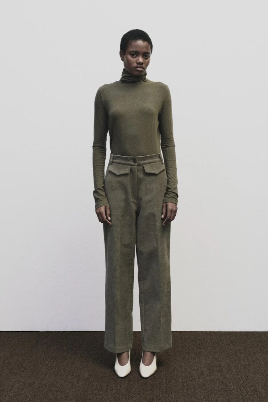 Light olive slim fit roll neck jersey top in stretch knit by Mijeong Park