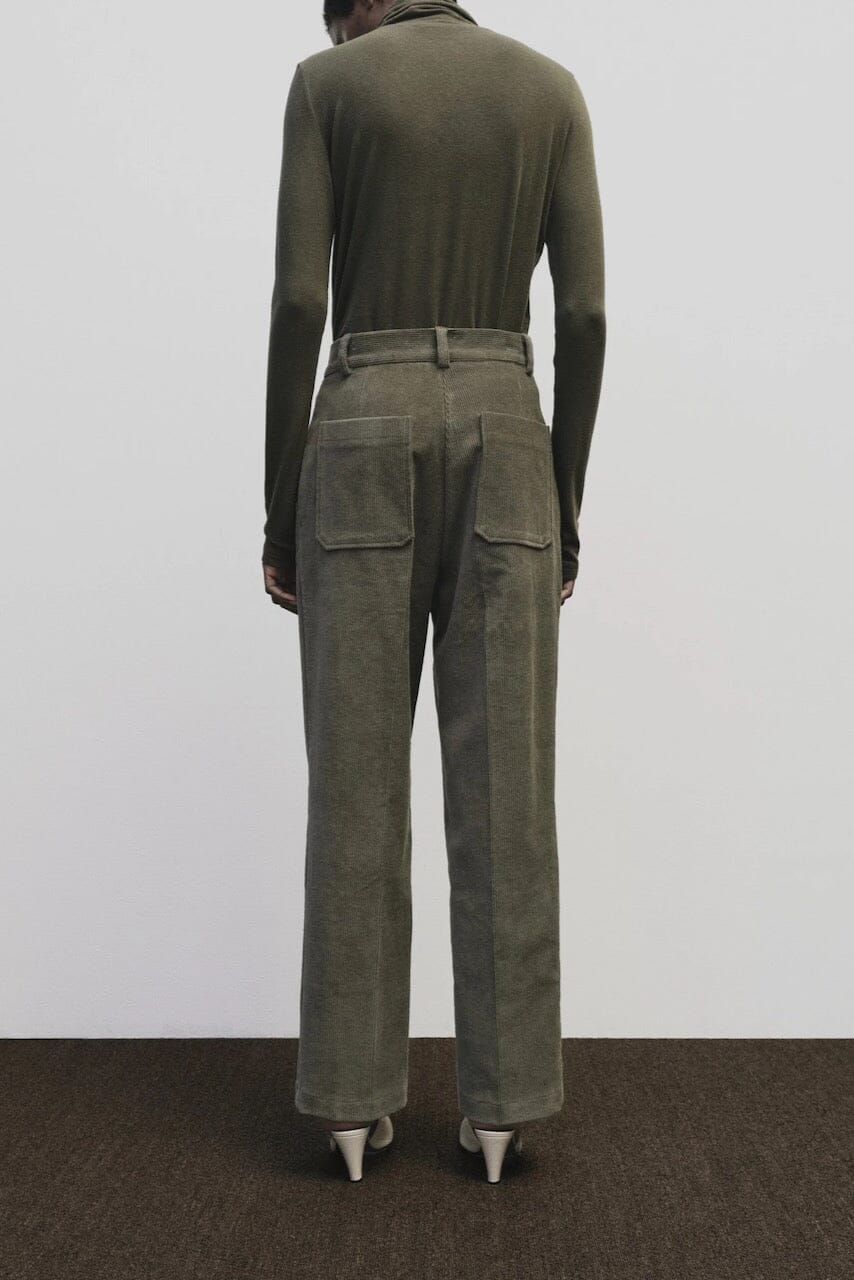 Light olive slim fit roll neck jersey top in stretch knit by Mijeong Park