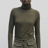 Light olive slim fit roll neck jersey top in stretch knit by Mijeong Park