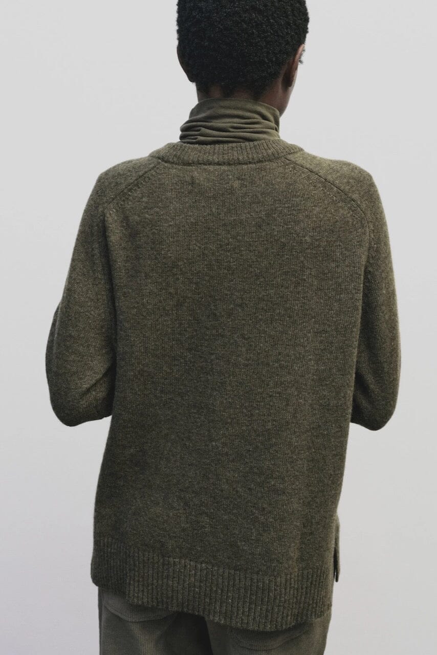 Light olive slim fit roll neck jersey top in stretch knit by Mijeong Park