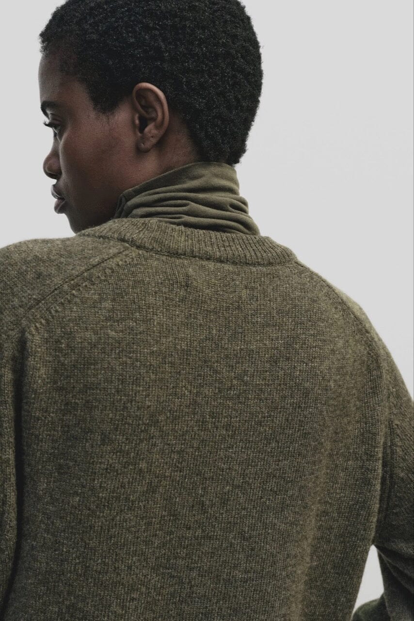 Light olive slim fit roll neck jersey top in stretch knit by Mijeong Park