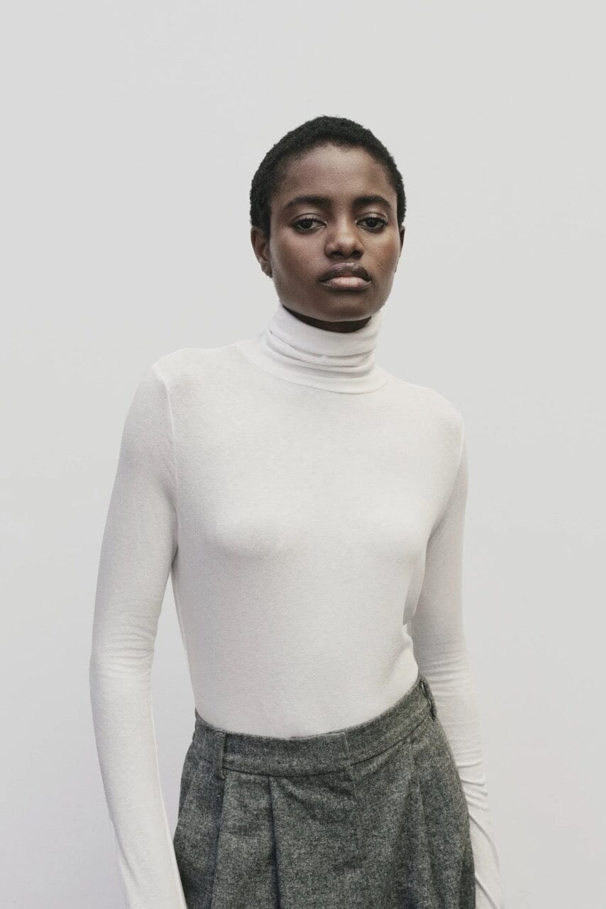 White slim fit roll neck jersey top in lightweight Tencel cotton by Mijeong Park